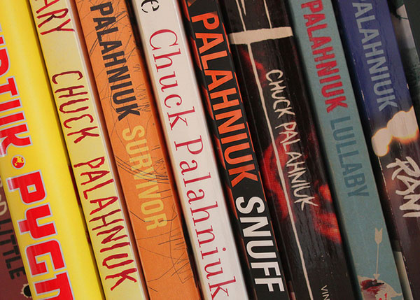 Chuck Palahniuk books on a shelf