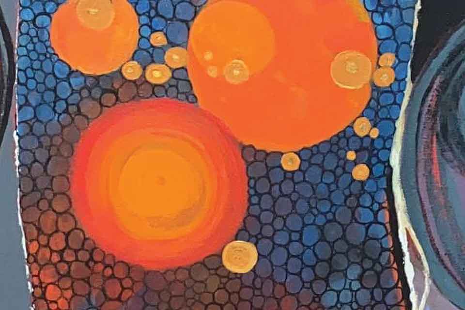 An abstract painting of three large orange circles on a field of very small blue-grey ones