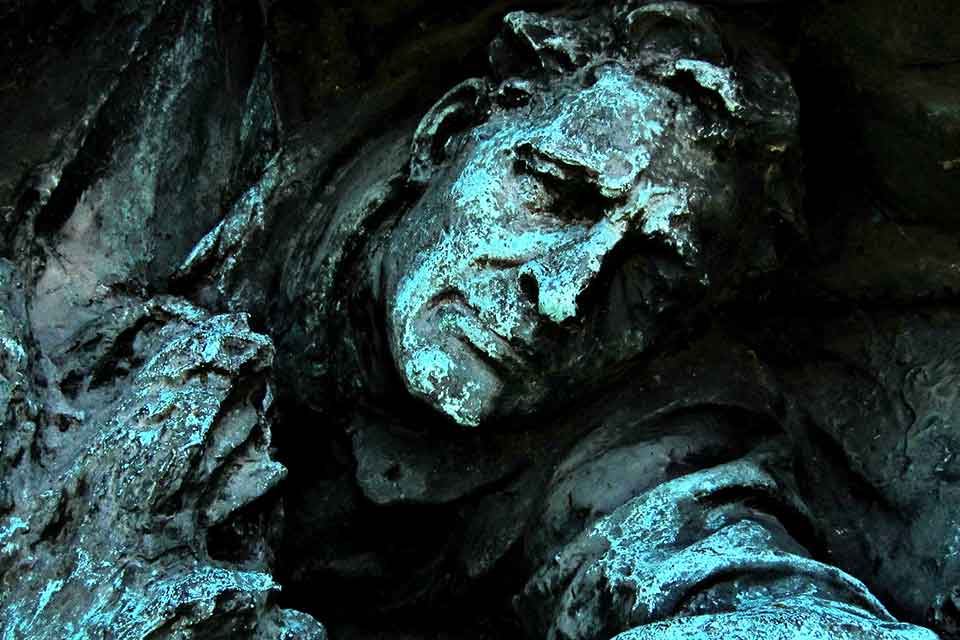 A bronze statuary of a man