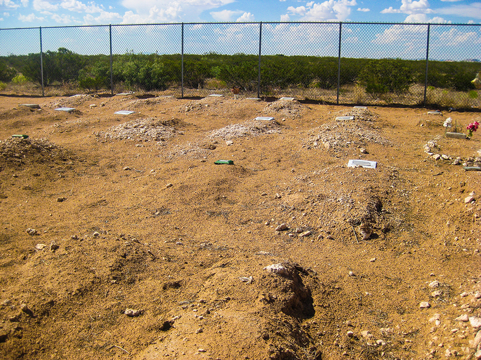 Grave at the US/Mexico border taken at a cemetery near Anthony, New Mexico, July 19, 2015 / Photo by Lanie Elizabeth