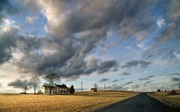 A photograph of a farmhouse