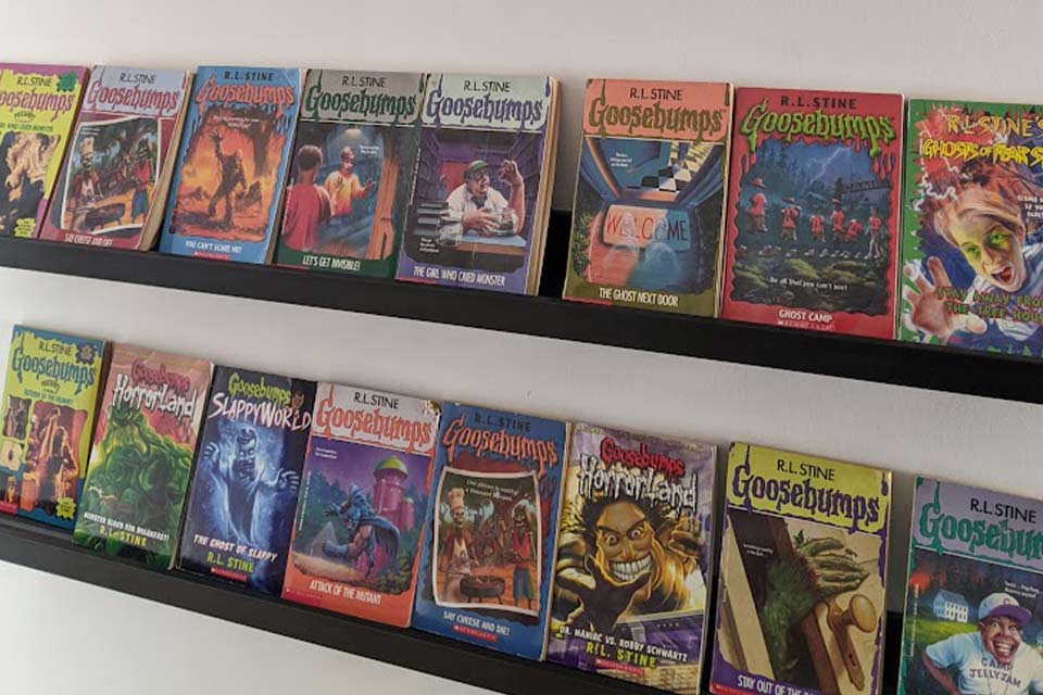 A photograph of a display of Goosebumps books