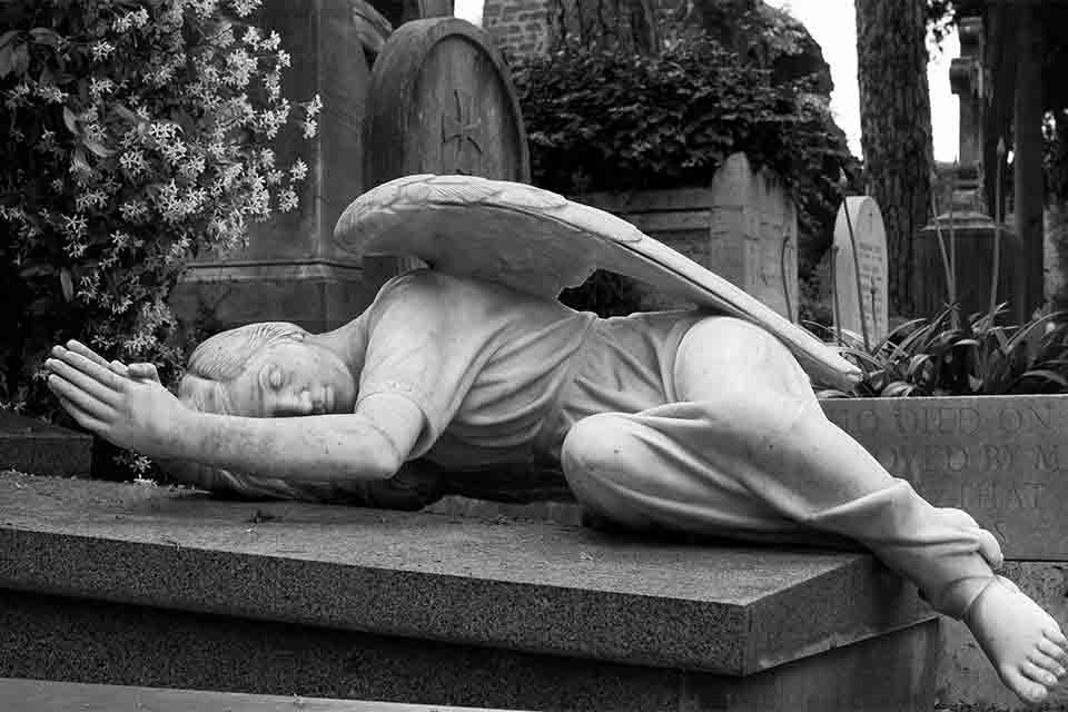 A winged figure reclining