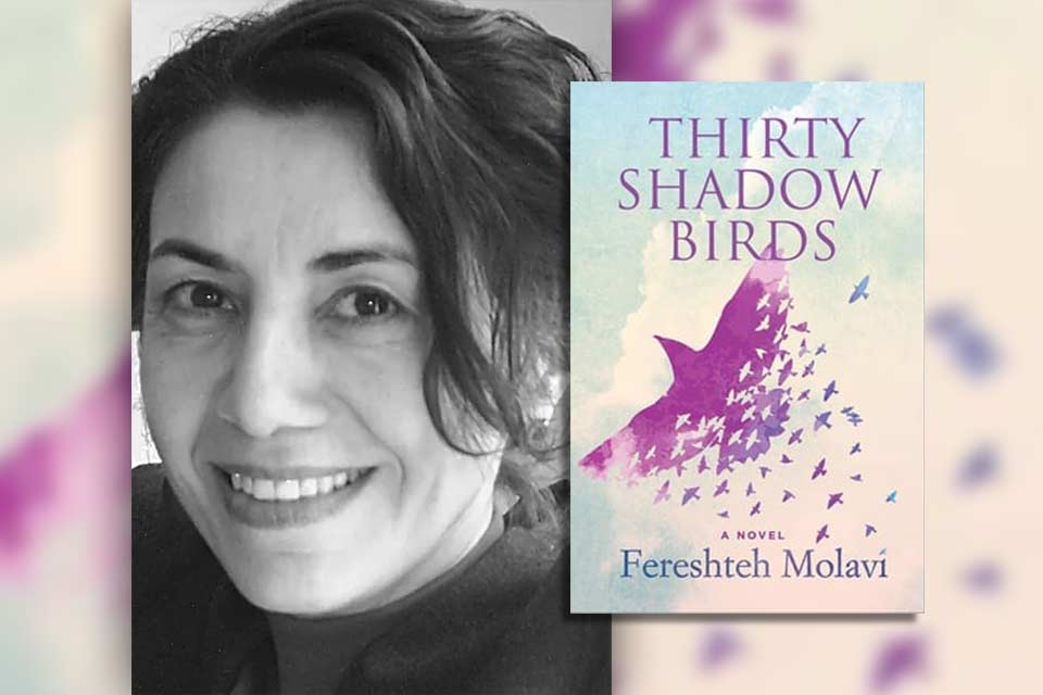 Fereshteh Molavi with the cover to her book Thirty Shadow Birds