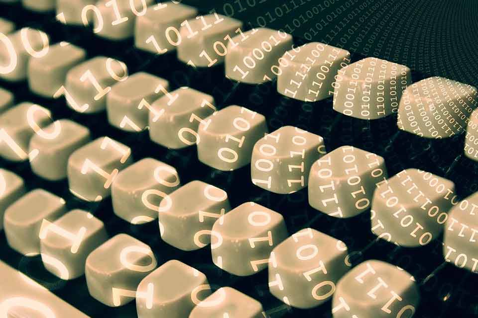 Digital numbers projected onto a computer keyboard