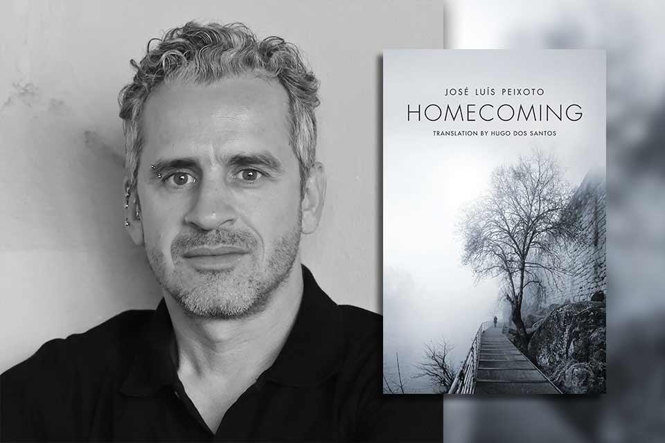José Luís Peixoto with the cover to his book Homecoming