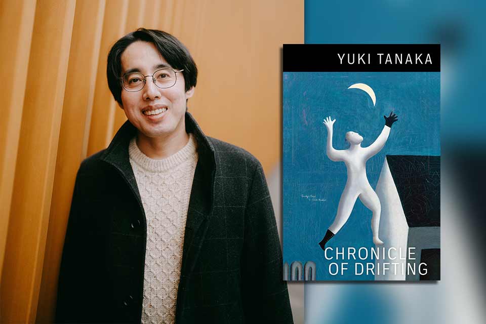 Yuki Tanaka with the cover to his book Chronicle of Drifting