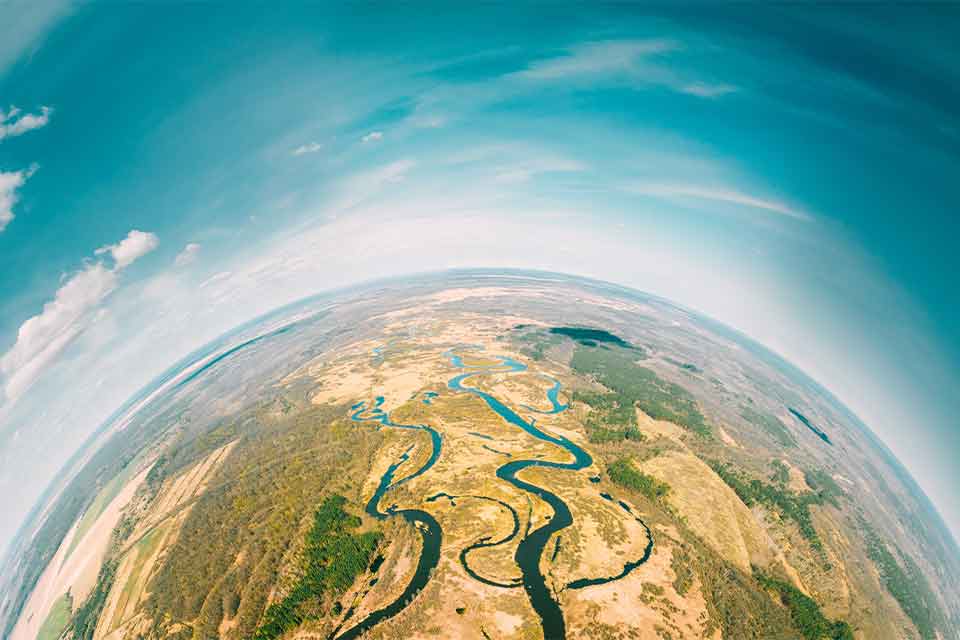 An aerial shot high above the Earth, taken with a fish-eye lens