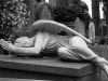 A winged figure reclining