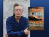 A picture of Stephen King and the cover to his book You LIke It Darker