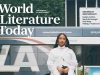 A crop of the March 2025 cover showing the logo and an African American woman standing in front of a bus with the word LA on the side