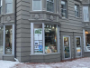 The exterior of a bookstore, which occupy the corner lot on a urban building