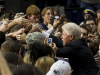Bill Clinton shaking hands with students
