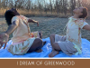 A photograph of two young women, sitting cross-legged on a blue blanket, with their arms outstretched. The text below reads: I Dream of Greenwood