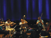 Liu Fang (center) plays the pipa during a rehearsal with the Matangi Quartet.