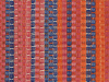 A photograph of a textile piece by Anni Albers. Colored bands (blue, yellow) travel downward against a red background