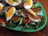 A close up photograph of a Nicoise salad