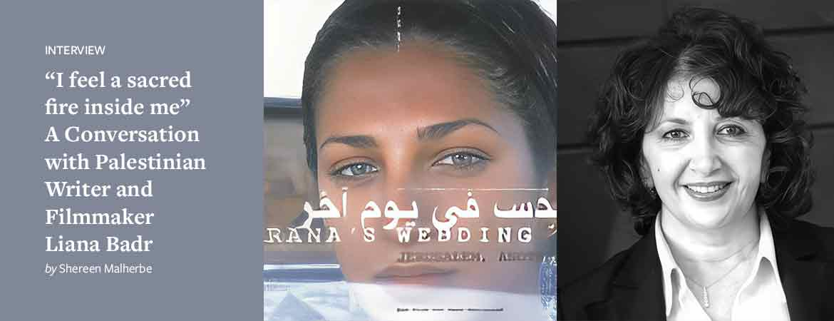 Liana Badr with the poster for her movie Al qods fee yom akhar