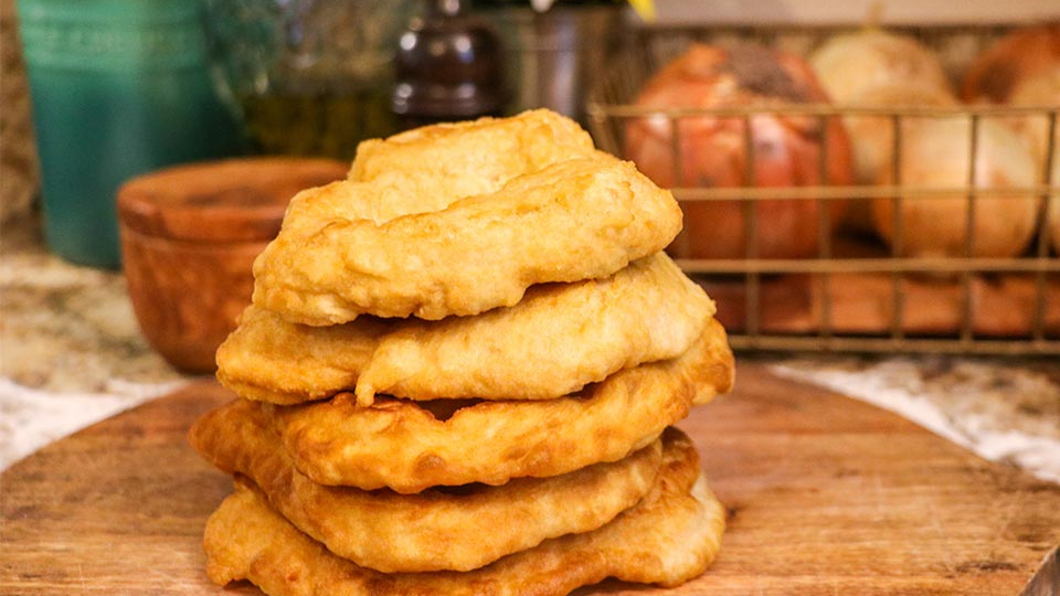 A photograph of a stack of frybread