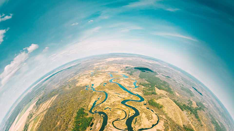 An aerial shot high above the Earth, taken with a fish-eye lens