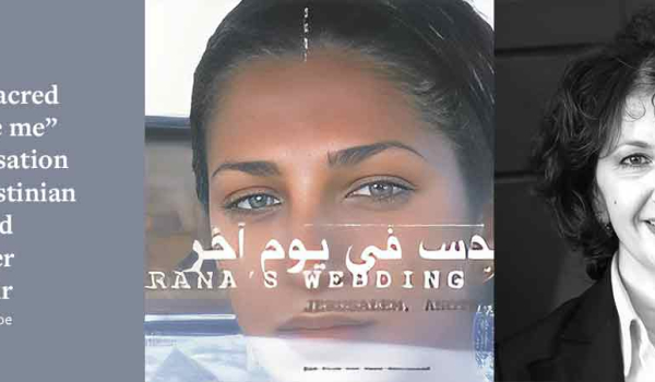 Liana Badr with the poster for her movie Al qods fee yom akhar