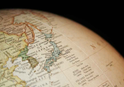 A detail of a globe that is rotated to display Japan and Korea