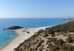 A photograph of a beach from an aerial view