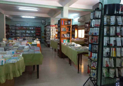 A photograph of the interior of the Cheikh Bookstore in Algeria
