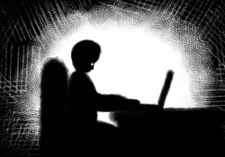 An illustration of a figure in shadow typing on a computer
