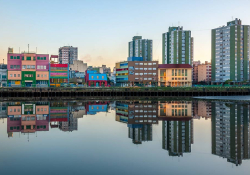 The skyline of Buenos Aires as reflected in a body of water on its edge