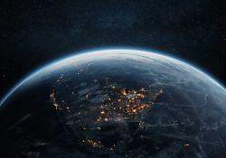 The Earth from space with United States facing the viewer, lit up by city lights below