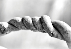 A detail of a wound cable, pulled taut