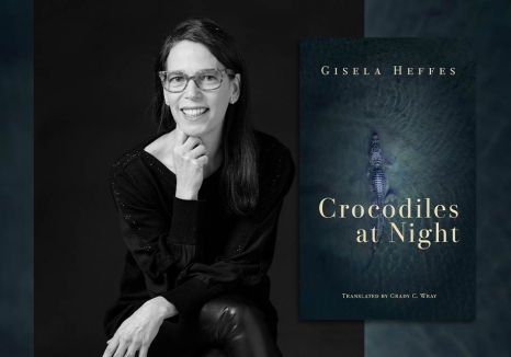 Gisela Heffes with the cover to her book in translation Crocodiles at Night